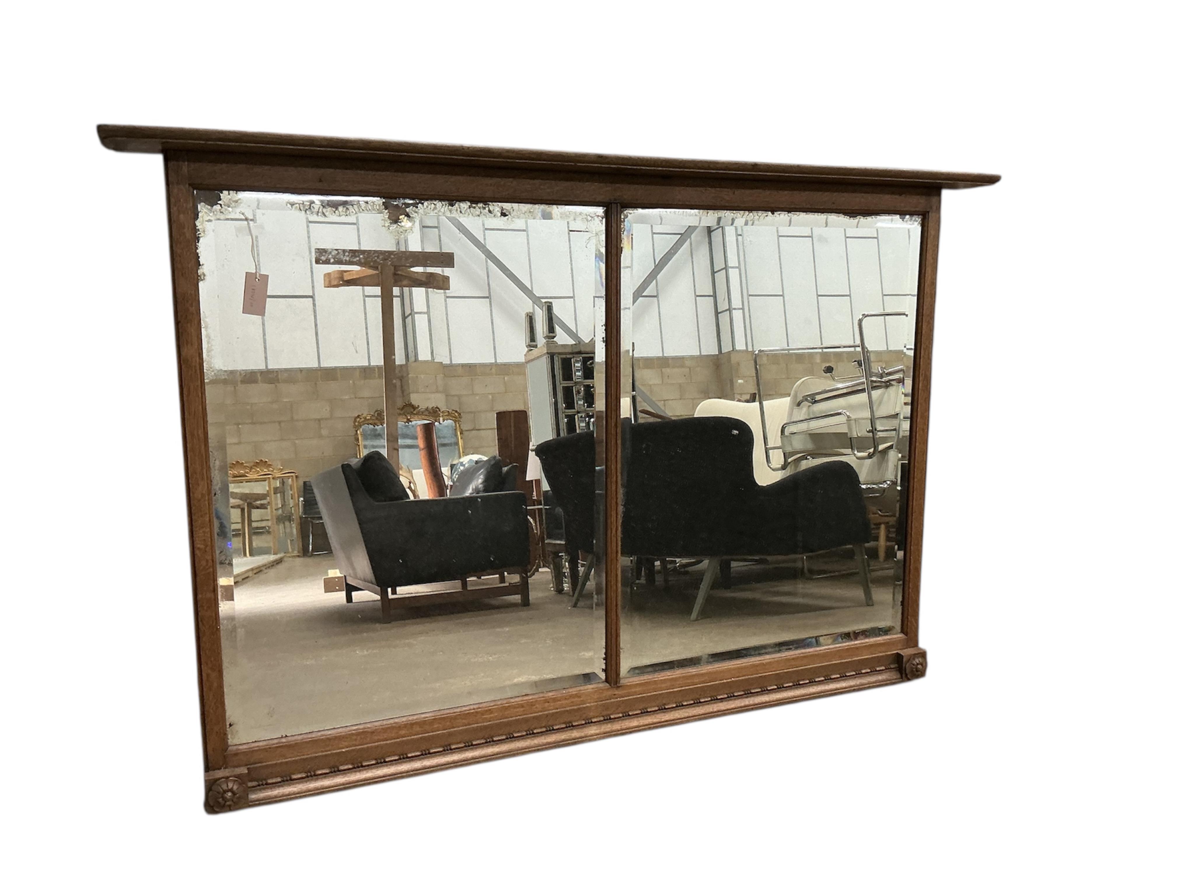 An Arts & Crafts rectangular twin plate overmantel mirror, width 175cm, height 114cm